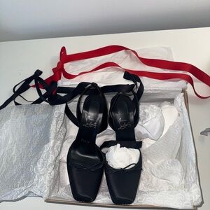 Christian Louboutin Black Heels with Red Accents